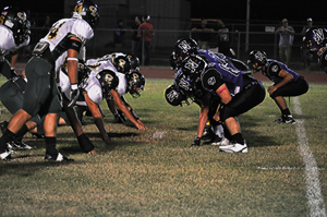 Canyon Lake Defense storming Panther Offense