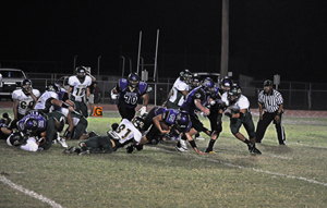 Senior Matt Noyola holding on for another Tackle