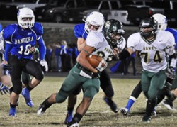 Eduardo Covarrubias plowing through some Bulldogs