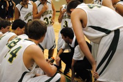 Freshman Coach Luke Chapman instructs CL Freshman during, 39-36 Win 