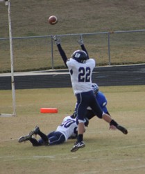 Kevin Knapick reaching for one of the 48 passes thrown in the game by Abilene