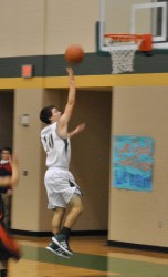 Matt Magness drives to the Basket