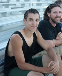 Jordan Anderson hanging with Dad as Track Meet draws to a close