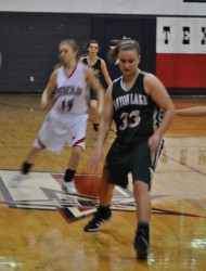 Caitlin Gillum going to the rim after one of her seven steals.