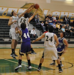 Doug Hubnik and Branson Belcher close in on another rebound.