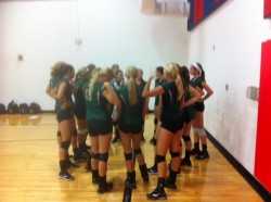 Hawks talk over strategy after Lockhart win in Silver Bracket on Saturday.