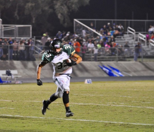 JJ Nance on his 23 yard run in the first quarter against Bandera