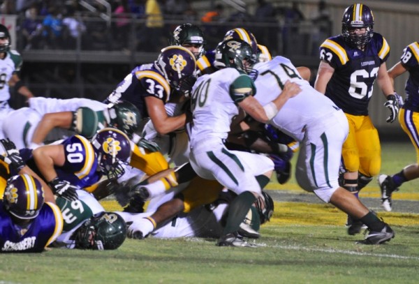 Ryan Hutcheson and Christian Dittman swarming on defense for the Hawks