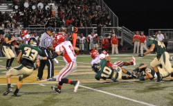 Defensive Back Javier Mendez catching a receiver