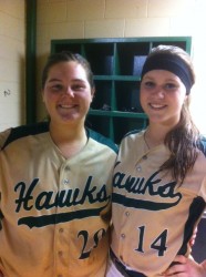 Seniors Brianna Young and Emma Broussard pose after final Hawk Game