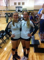 Kaylie Duke and Faith Hasness are all smiles after recording their first win of the season.