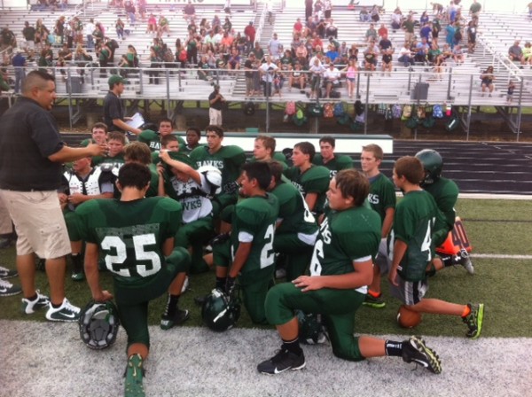 Mountain Valley 7th Grade gathering for their first of many after game talks with a score that far exceeds their competition.