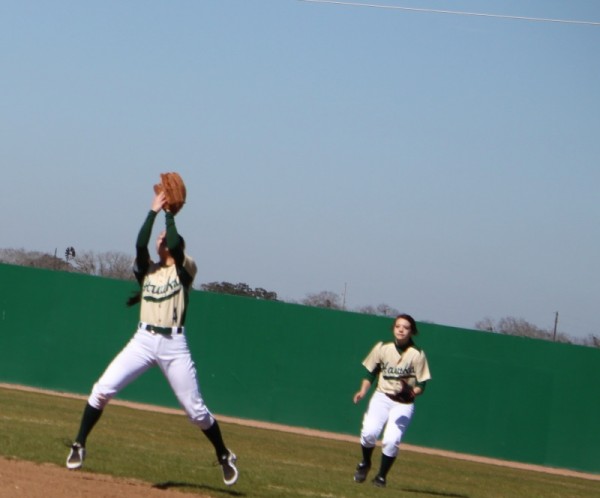 2nd Baseman Kirsten Jones snagging another ball for an out.