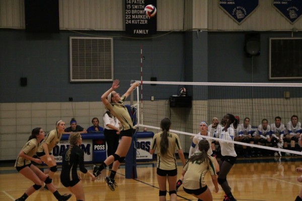 Addison Farley going for a kill in Canyon Lake's game with Yoakum