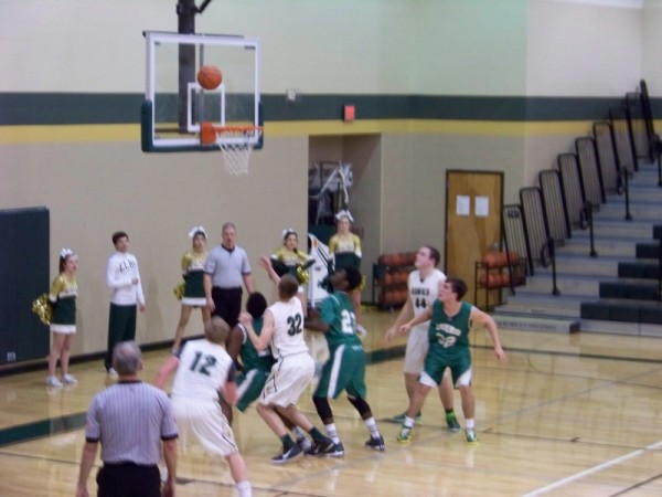 Hawks in a battle for rebounds against Cuero during 2015 Season