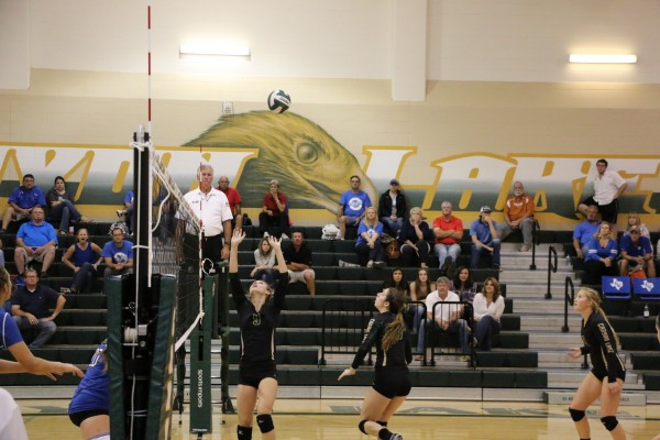 Setter Regan Mickey setting Emma Gray for the Post Kill