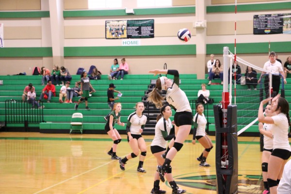 Zoe Edwards showing good form for a kill in Win against Cuero