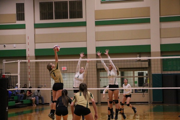 Canyon Lake's Addison Farley scoring a kill during Cuero game