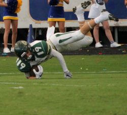 Taner Faris digging for Gold in Win over Blanco