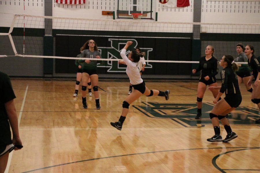 Libero Sam York getting a key save in win over Marion