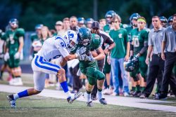 Tanner Faris fighting for first down