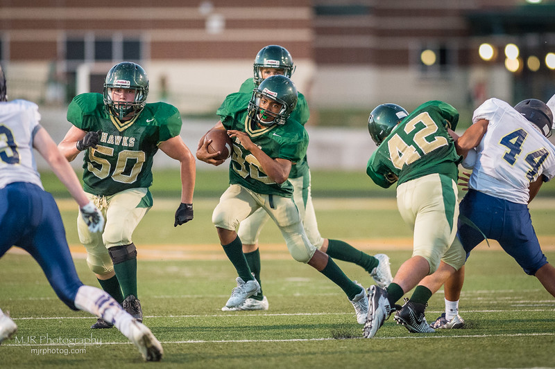 Caleb Almond running through huge hole by OL with Jace McBride & Nick McCormick leading way