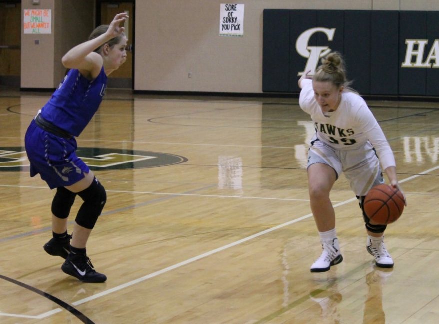 Junior Reagan Heun driving for the basket in loss to Lehman