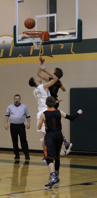 Joseph Boyd fights for rebound in earlier game with Llano