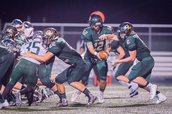 QB Ben Fulton giving the Rock to Micah St. John who finished with 111 yards