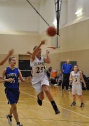 Emily Moore passing for an Assist helping Hawks in Win
