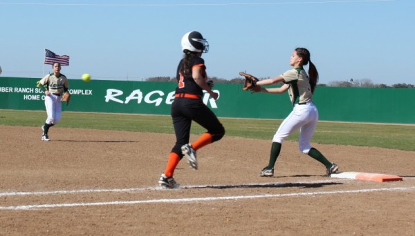 First Baseman Tiare Kacir readies for a put out.