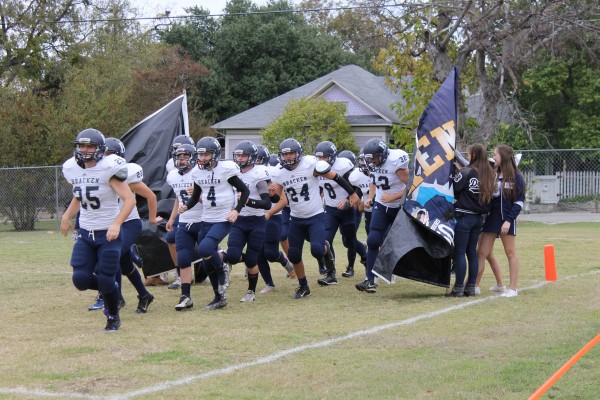 Bracken Warriors Breaking Through before Game with Crusaders