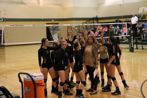 Emma Gray #5 after Hawk Timeout in Volleyball